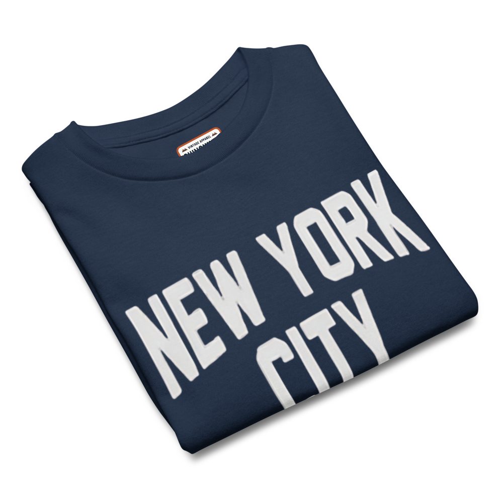 Folded navy blue sweatshirt with 'New York City' text on a white background